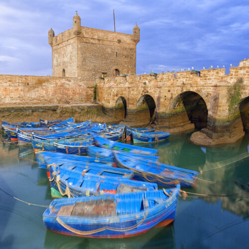 Morocco, Essaouira, blue fishing boats in the harbour